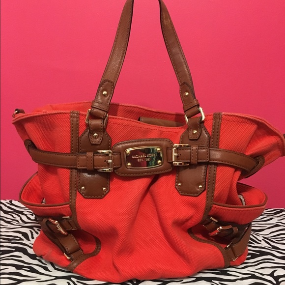 Authentic Michael Kors orange canvas bag