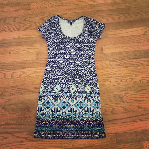 blue, green, orange, yellow, pink, and white dress