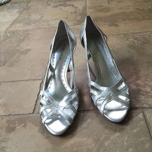 Silver BCBGirls heels brand new with 2 in. heel!