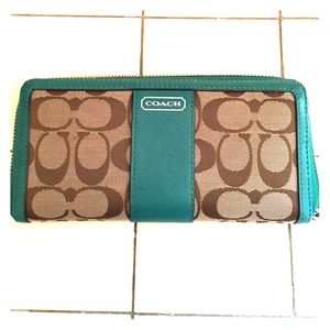 Authentic Coach wallet with green leather trim