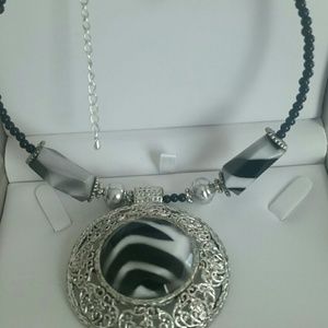 Silver and zebra print necklace