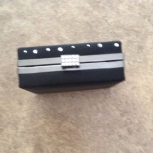 Black square purse with embellishments