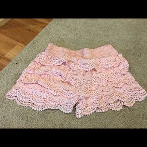 Shorts but kid of looks like a skirt.