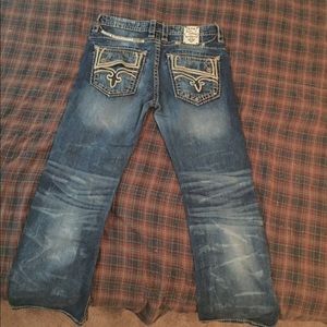 Men's 38R Rock Revival boot cut jeans.