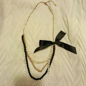 Aldo bow and pearl necklace