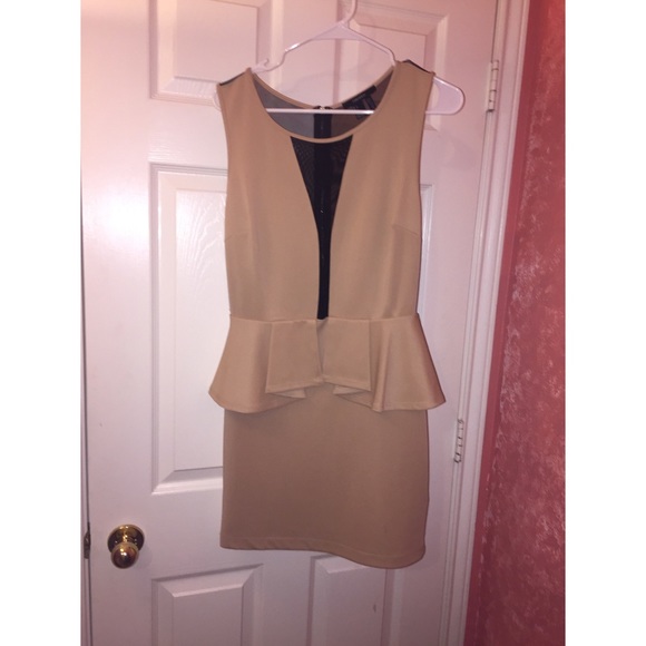 Nude peplum dress