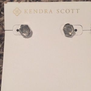 Kendra Scott studs earrings.
