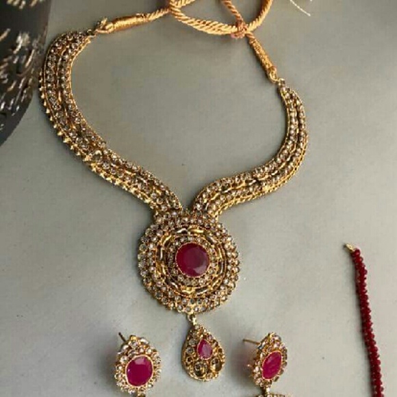 Brand new Gold and Maroon necklace earring set