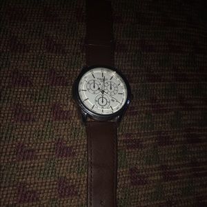 Brown Belted Tissot watch
