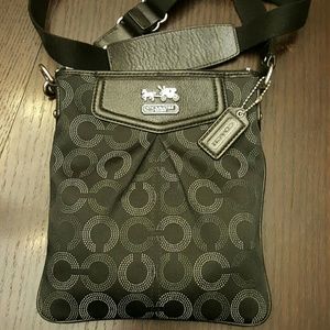 Beautiful Coach crossbody with blue satin interior