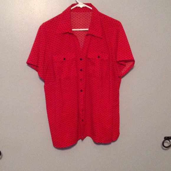 Red with black polka dot shirt