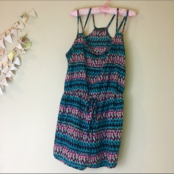 NWOT Romper with unique blue and pink print