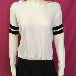 Cream color long sleeve t-shirt.
