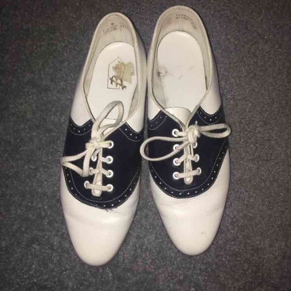 Black and white Oxford shoes