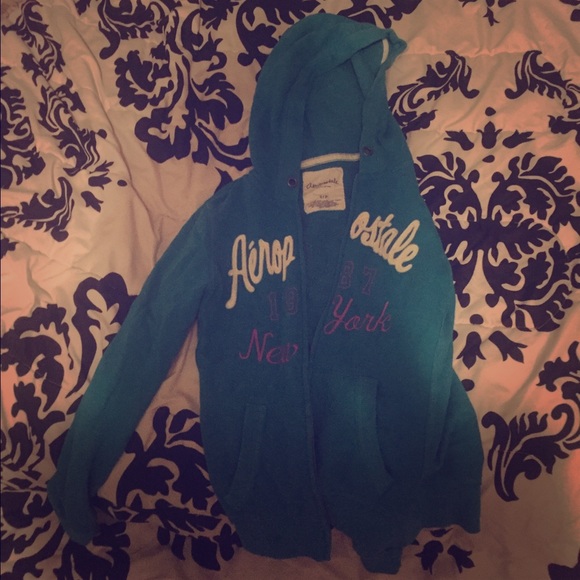 A blue zip up Aeropostale jacket