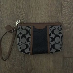 Coach signature with snakeskin stripe wristlet