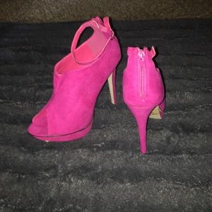 Beautiful fuchsia peep toe booties.