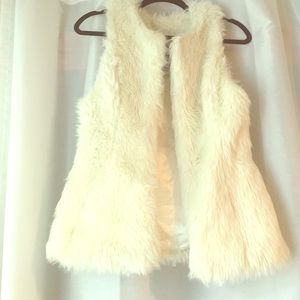 Adorable and comfy white furry vest