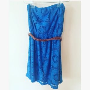 Bright blue strapless dress with brown belt