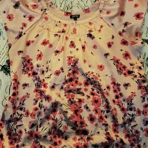 Pink blouse with pink/black floral pattern