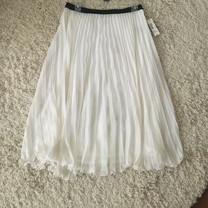 White pleated skirt