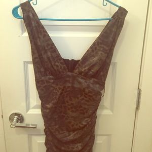 Form fitting bebe liquid snake skin dress