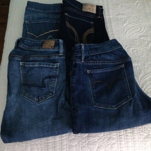 4 pairs of dark wash jeans