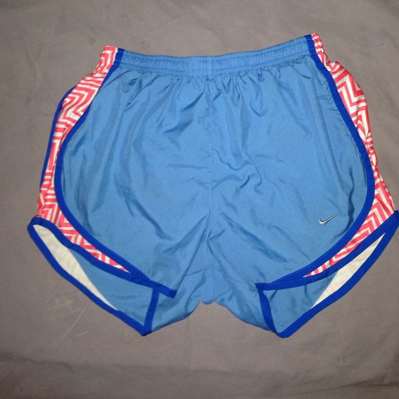 blue and coral Nike shorts