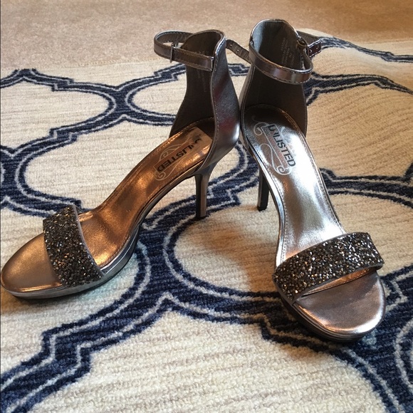 Sparkly silver toned high heels size 7. Worn once