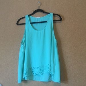 Sea foam tank top with flower cutouts