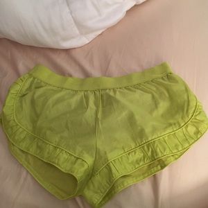 Stella McCartney yellow running shorts