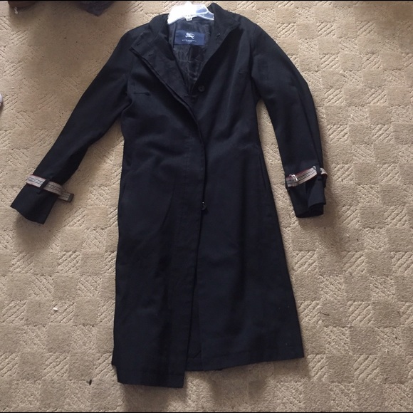 Burberry knee length trench coat.