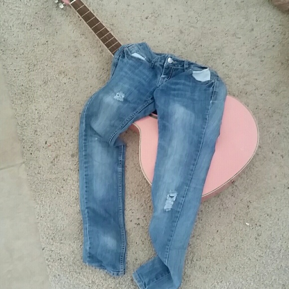 Nice slightly worn look skinnies size 3