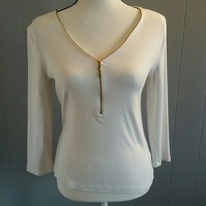 Long sleeved shirt with gold zipper
