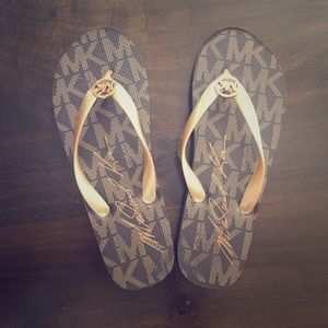 Michael Kors flip flops (never worn)