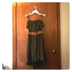 Small strapless green dress with belt