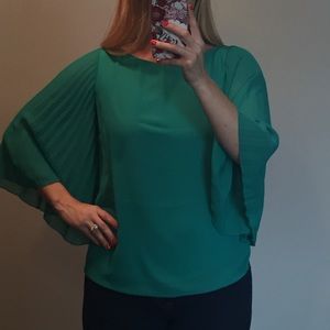Green top with flows sleeves