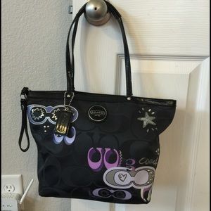 Coach purse in black & purple