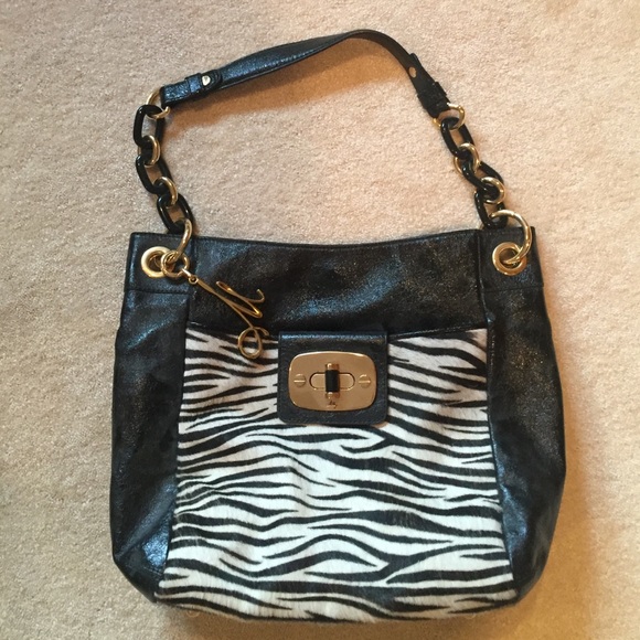NWT beautiful leather Milly handbag.