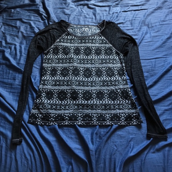Thin, long sleeved shirt.