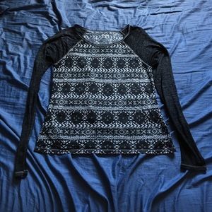 Thin, long sleeved shirt.