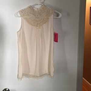 Cream lace blouse.