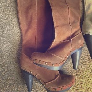 Brand new. Never worn heeled suede boots.