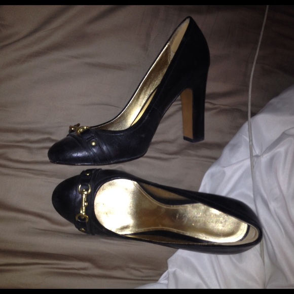 Navy blue coach pumps gold detail