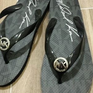 Michael Kors signature flip flops NWOT