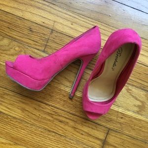 Hot pink high heel shoes
