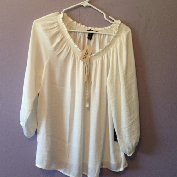 A white, puffy shirt.