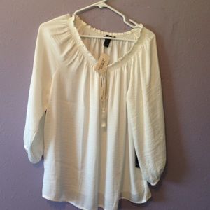 A white, puffy shirt.