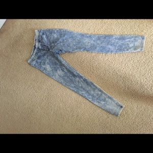 Tight fitted blue faded jeans