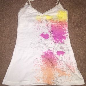 White cami with color spattered floral print
